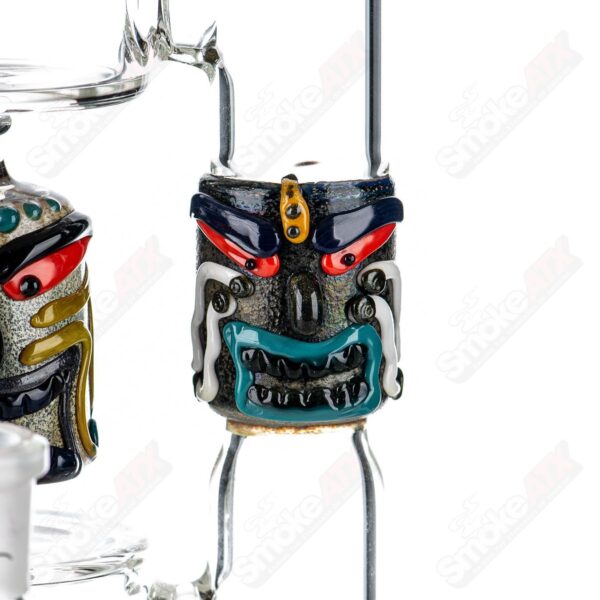 Shop Spinning Tiki Head Scientific Tube by Carsten Carlile & Dirty Rico Glass in australian